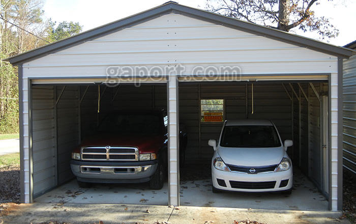 Metal 20x20 two car garage installed on a concrete slab in the state of California.