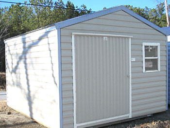 Shown here is a portable shack or shed with a large door.