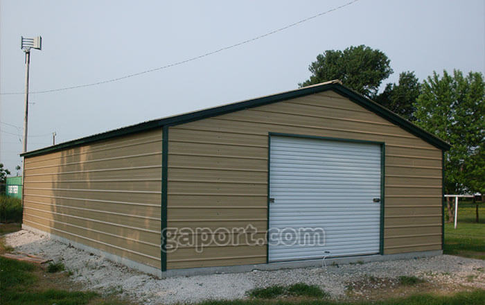 With a concrete base, this garage is a 24x40x8, peak height of 11 ft 11 in.
