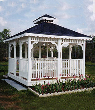 A beautifully pictured square white crafted gazebo with shingled double roof.