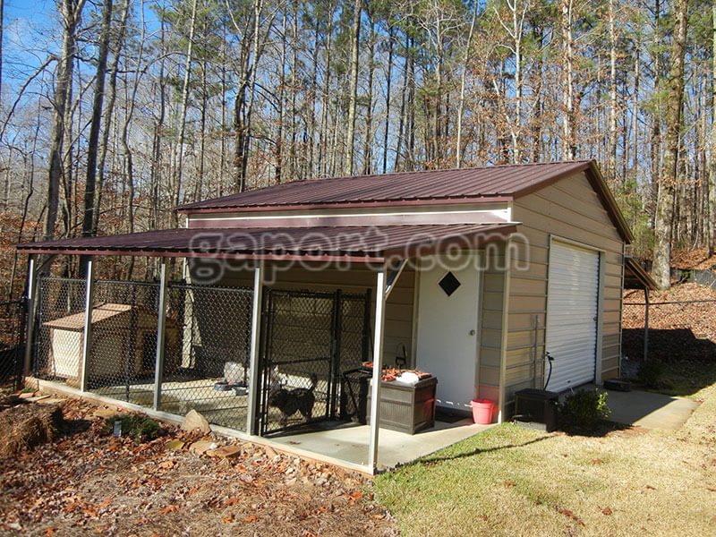 Angled view of metal garage with kennel area for dog pen.