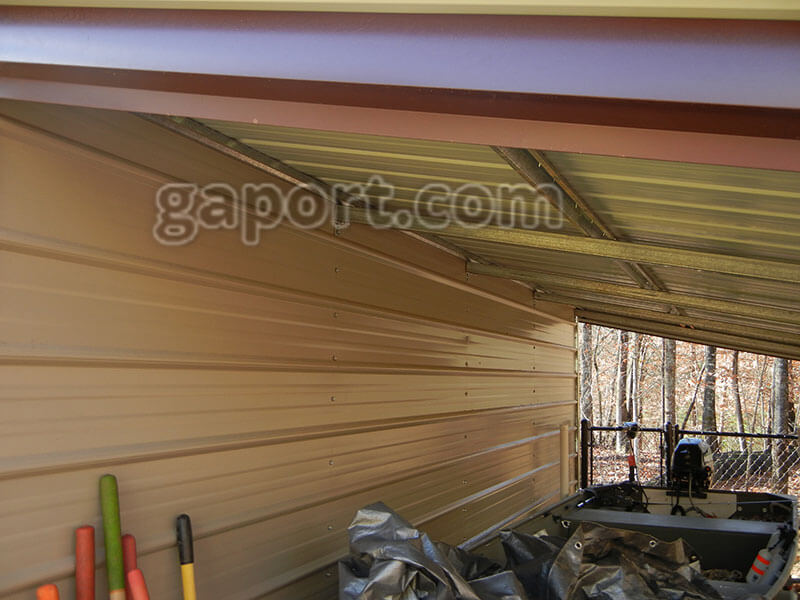 Exterior eave area pictured showing metal garage side panels.