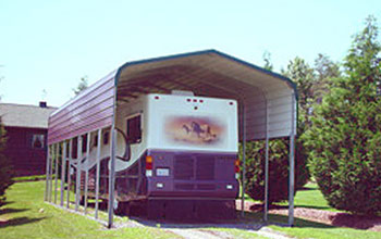 A cost effective and tall rounded roof style metal carport is shown here.