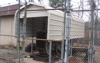 Even a very small, industrial outdoor metal covered space protects from inclement weather.