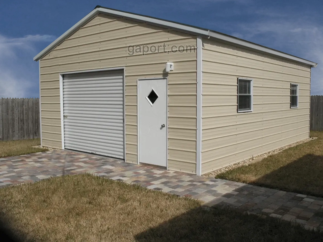 Learn more about this installed metal structure with garage door.